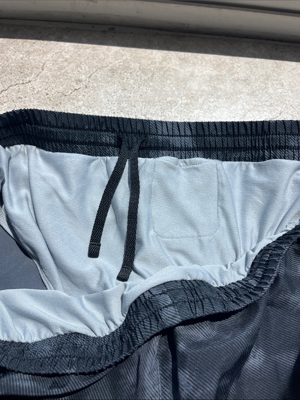 Under Armour Black Shorts with Blue Trim - Picture 5 of 8